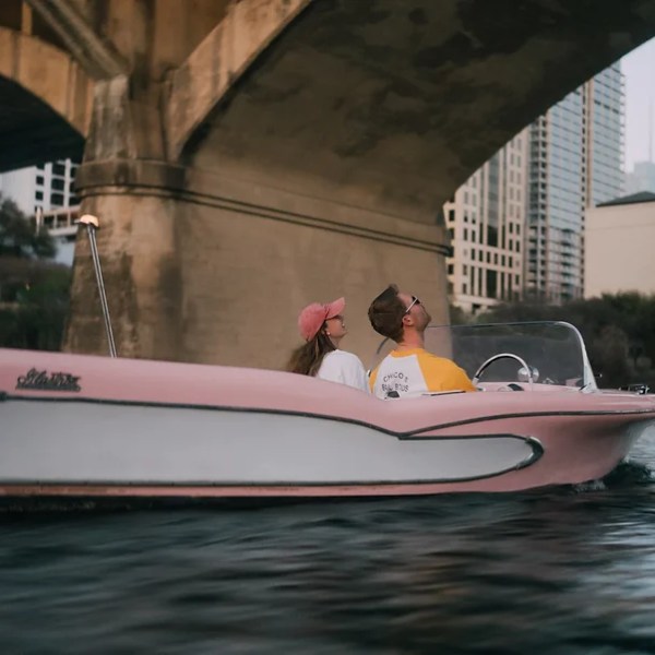 a small boat in a body of water