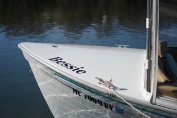 a small boat in a body of water