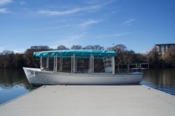 a small boat in a body of water