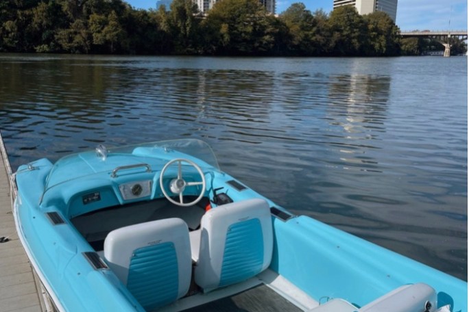 a boat parked next to a body of water