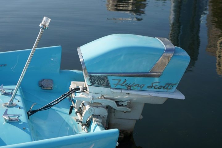 a small boat in a body of water