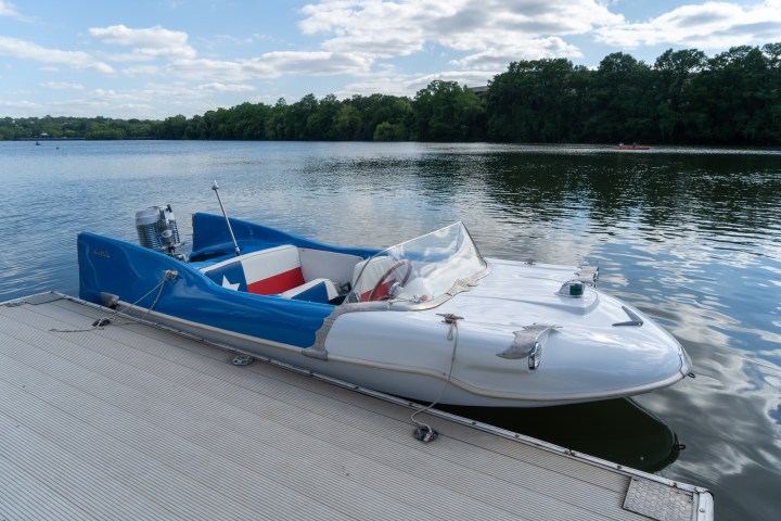 a small boat in a body of water