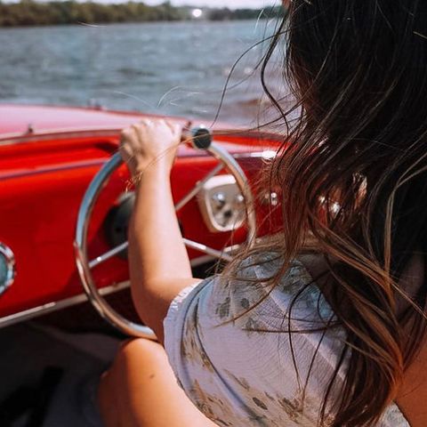 a woman looking at the camera