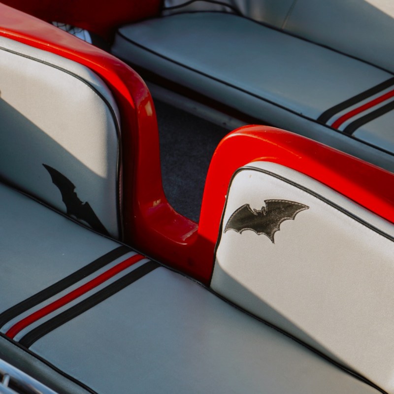 a piece of luggage sitting on top of a car