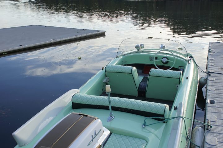 a boat parked next to a body of water