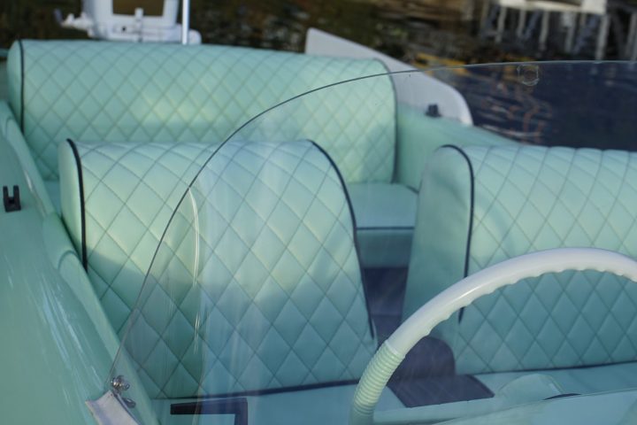 a boat sitting on top of a ramp